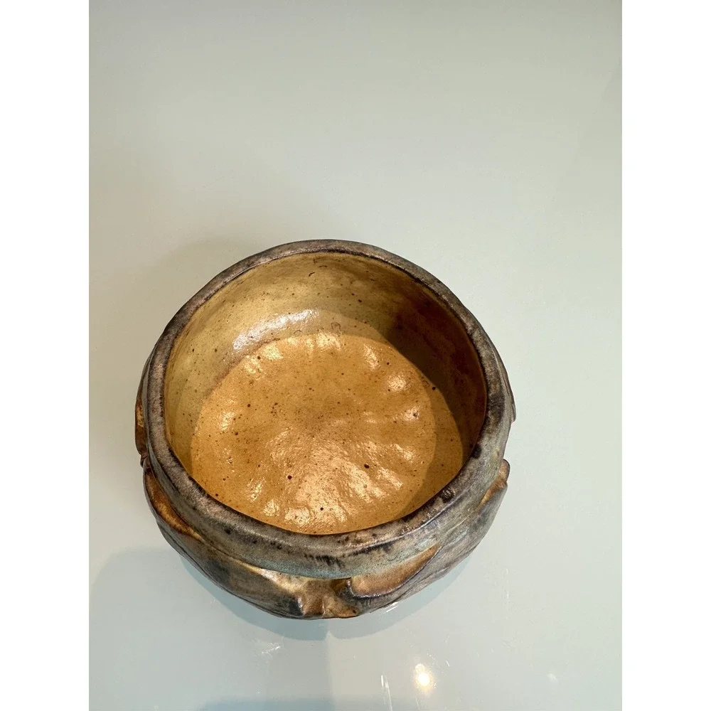 antique stone vase‎ with ornament in the form of fish